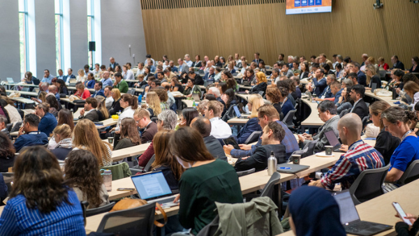 A photo of a large, busy lecture theatre at the EGPA conference