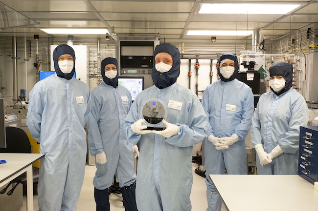 An image of the key scientists who fabricated the commemorative 850-year anniversary of Glasgow wafer.