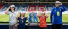 Demi Boyd, curator of Hampden Museum, with Calum Livingstone, Hampden Visitor Services Officer, and pupils from Craighead Primary School, Milton of Campsie, Annabel Gelston, aged 10, (left) and Roma Stevenson, nine.