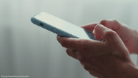 A person using a mobile phone