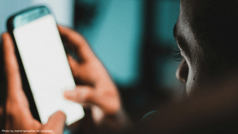 Young person using a phone