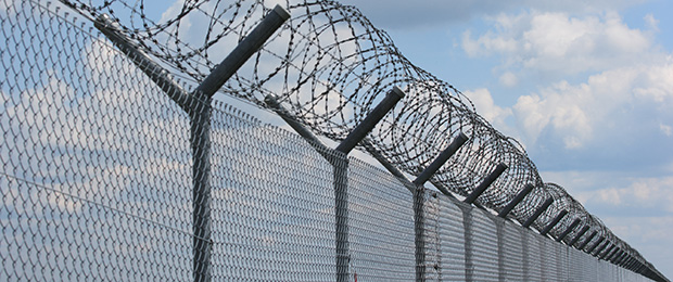 barbed wire fence at an airport
